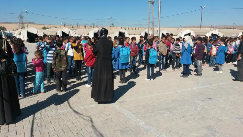 Children singing free Syrian anthem in the Nizip camp